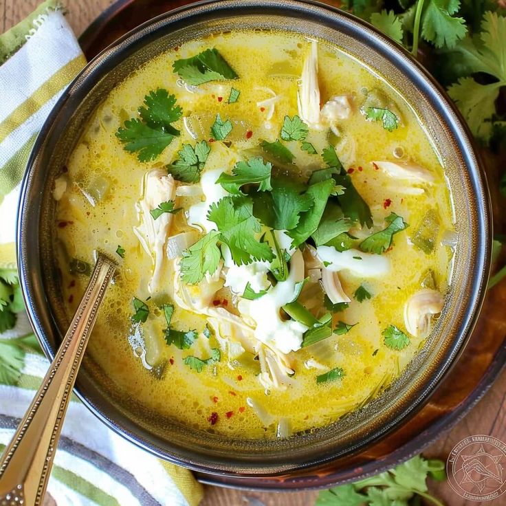 a bowl filled with soup and garnished with cilantro