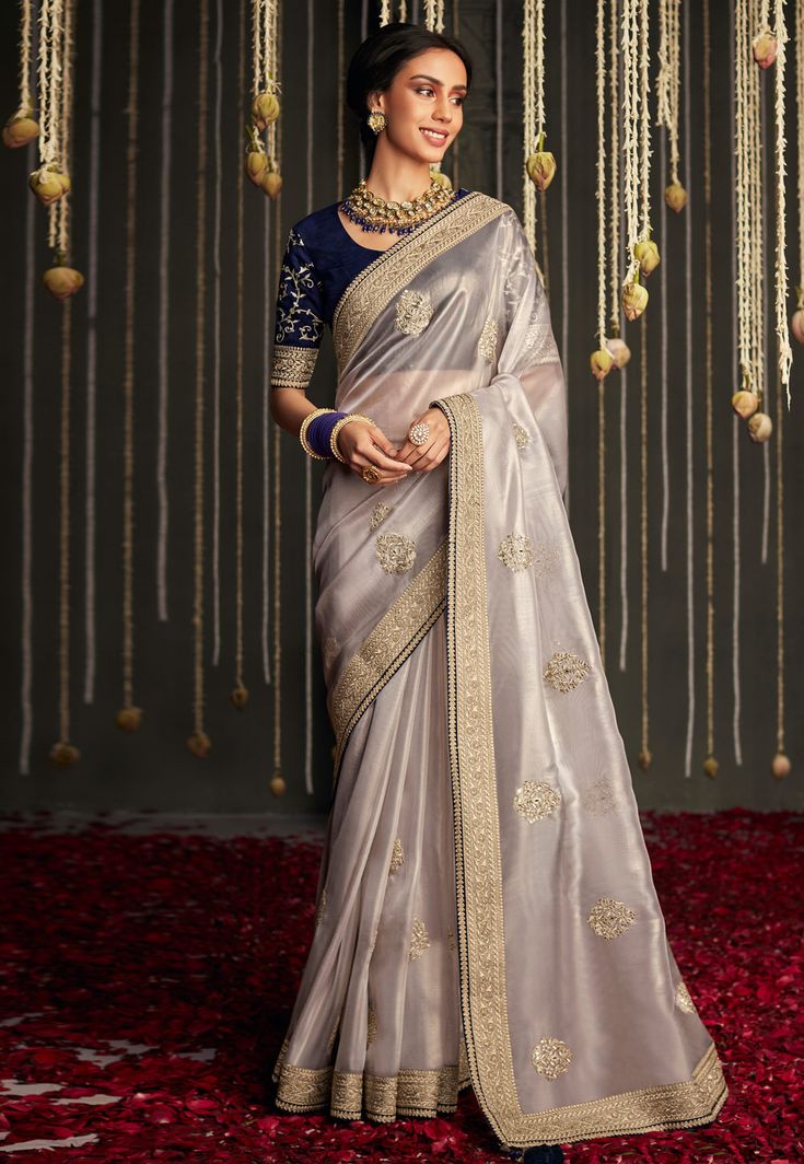 Silk Saree with blouse in Grey colour 5224  Desc:  Color : Grey Fabric : Silk Wash Care : Dry clean Sleeve Style : Half Sleeve Long Sleeves : Done only in Custom Stitch Sleeves Lining : Done only in Custom Stitch Bust Size : 32 to 42 Inches Occasion : Reception   Gudi Padwa   Wedding   Mehendi   Sangeet   Party Wear. With Express Free Shipping and Custom Stitching, Buy Indian Party wedding wear Bridal Sarees Silk Saree with blouse in Grey colour 5224 online in USA, UK and Canada from KollyBollyE Silver Saree, Gold Silk Saree, Saree Work, Design Saree, Organza Silk Saree, Designer Silk Sarees, Blouse Saree, Silver Silk, Party Kleidung