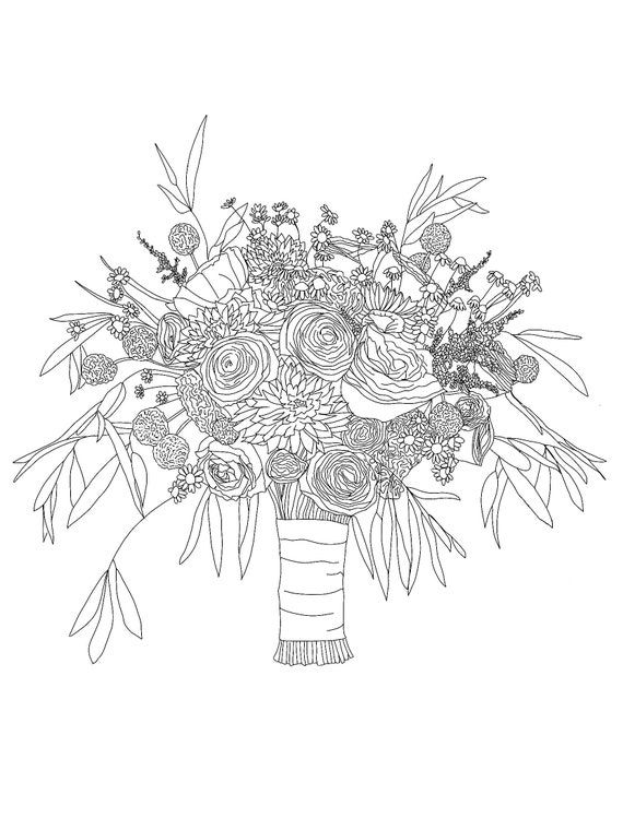 a vase filled with lots of flowers on top of a table