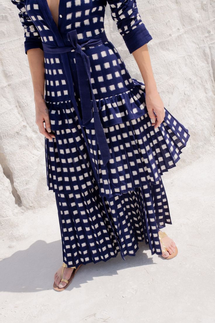 De Castro showcases a seamless and unique blend of traditional Indian craftsmanship, contemporary design, and the founder’s Colombian heritage. Every piece is handmade by artisans, using time-honored techniques and the finest cotton and silk fibers, resulting in exceptional quality, sustainability, and style. Crafted in a navy blue and white double ikat hand-loom fabric, the Lapiz Lazuli Dress features a deep neckline, pleated skirt, and puff sleeves for a hint of romance. We love its matching b Handloom Fabric, Deep Neckline, Traditional Indian, Hand Loom, Puff Sleeves, Pleated Skirt, Dress Making, Day Dresses, Loom