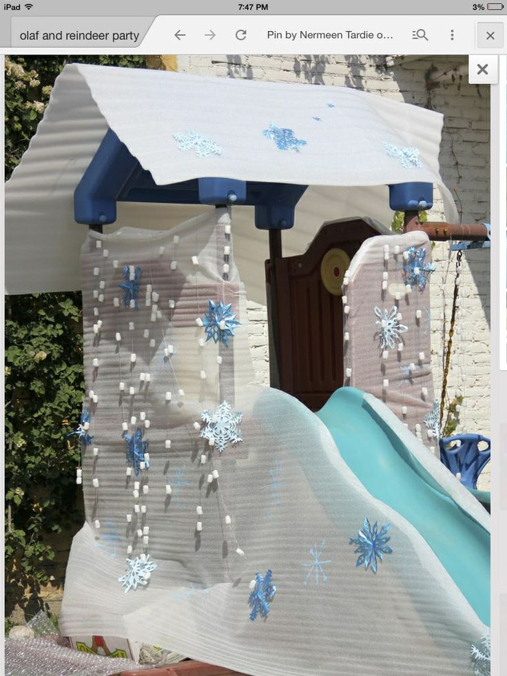 an outdoor play structure with snowflakes on it