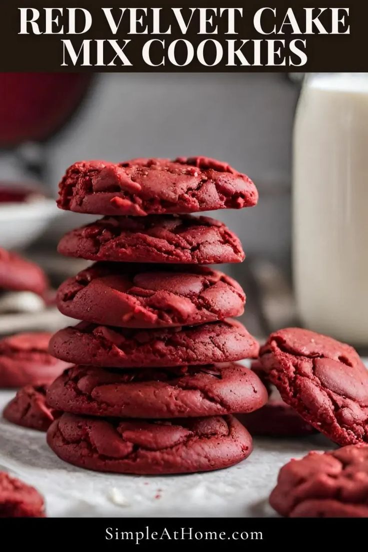 red velvet cake mix cookies stacked on top of each other with milk in the background