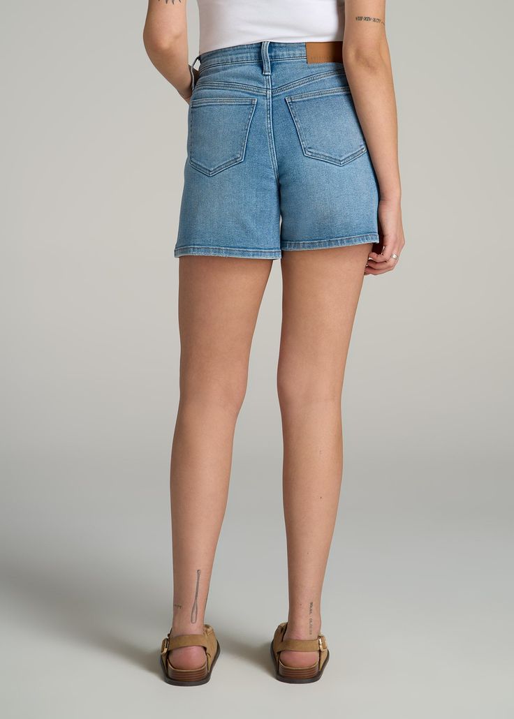 High Rise Denim Shorts for the Tall Fashionista Your Newest Summer Essential Get ready to make a statement this summer with our High Rise Denim Shorts, our latest women's shorts in tall sizes. These shorts offer a flattering high-waist design and a thigh-length cut that perfectly balances comfort and style. With a versatile look that can be dressed up or down, these tall women's shorts are a must-have for your warm-weather wardrobe.• High-waisted design for a flattering silhouette• Thigh-length Light Wash Mid-rise Bottoms With Built-in Shorts, Denim Blue Bottoms With Built-in Shorts, Mid-rise Cotton Bermuda Shorts For Summer, High Waist Denim Bermuda Shorts For Summer, Summer Mid-rise Cotton Bermuda Shorts, High-waist Denim Bermuda Shorts For Summer, Medium Wash Short Leg Denim Bottoms, Relaxed Fit Bottoms For Spring, High Rise Denim Bermuda Shorts For Spring