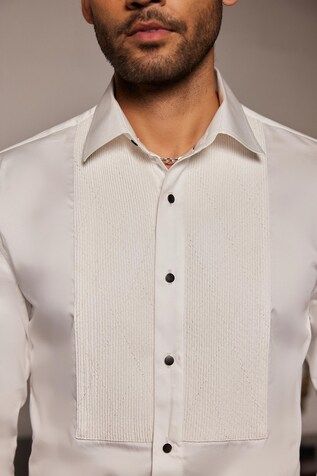 White cotton shirt with geometric embroidery on the front placket. - Aza Fashions Fitted Embroidered Shirt With Spread Collar, Formal Embroidered Cotton Shirt, Embroidered Fitted Shirt For Formal Occasions, Formal Fitted Embroidered Shirt, Fitted Embroidered Top With Spread Collar, Luxury Embroidered Fitted Tops, Formal Embroidered Button-up Shirt, Designer Formal Tops With Lapel Collar, Designer Short Sleeve Formal Tops