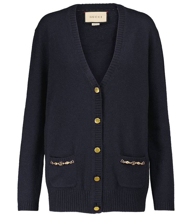 This dark blue cardigan is from Gucci's Ouverture collection, which mixes archival codes with modern silhouettes. It's made in Italy from cashmere and trimmed with golden pocket chains featuring the house's Interlocking G hardware. Classic Gucci Wool Cardigan, Gucci Long Sleeve Sweater For Work, Gucci Cardigan For Winter Workwear, Gucci Winter Workwear Cardigan, Gucci Long Sleeve Cardigan For Work, Chic Gucci Wool Outerwear, Gucci Classic Winter Cardigan, Classic Gucci Fall Cardigan, Classic Gucci Winter Cardigan