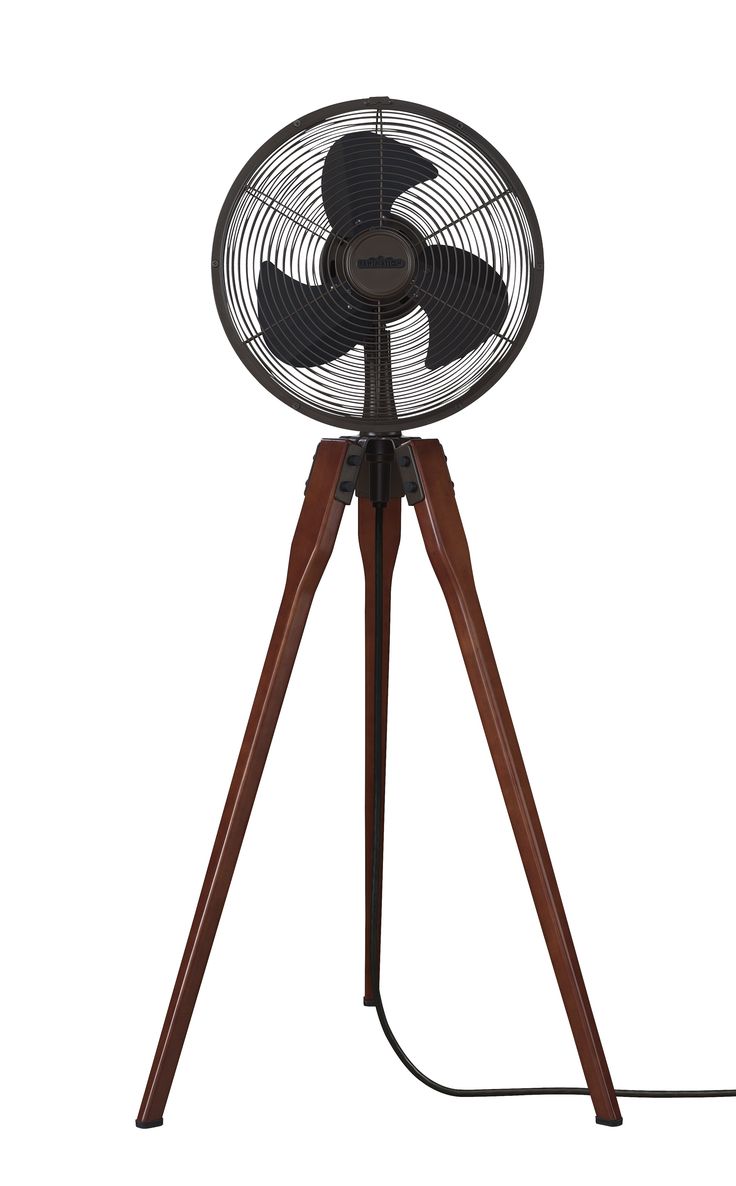 a black fan sitting on top of a wooden tripod