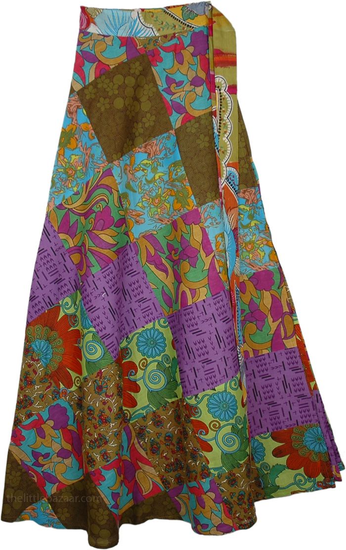 Multi Floral Wrap SkirtMulti floral boho hippie wrap skirt made from pure soothing cotton this skirt features a colorful mix of patchwork floral design. The soft fabric is vividly printed in a fabulous collage of lively colors to complement a variety of styles and occasions. Finished with a self-tie front style wear this girly skirt with tan wedges and a dainty necklace for a beach-ready look. Unlined. Made from cotton, this garment drapes very well and can be worn either like a skirt or a dress Spring Green Patchwork Maxi Skirt, Multicolor Hippie Skirt For Festivals, Cotton Patchwork Maxi Skirt, Bohemian Cotton Maxi Skirt For Festivals, Hippie Cotton Patchwork Maxi Skirt, Bohemian Multicolor Floral Print Skirt, Green Bohemian Patchwork Maxi Skirt, Bohemian Green Patchwork Maxi Skirt, Hippie Cotton Wrap Skirt For Beach