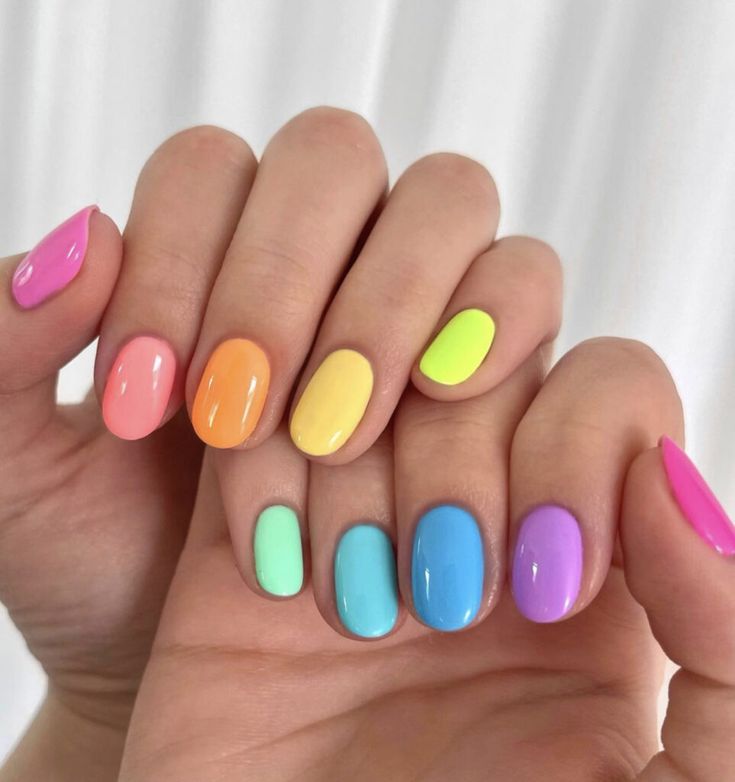 The Top Summer Nails Ideas and Trends for 2022 Gel Polish Colors Summer 2024, Rainbow Nail Polish, Rainbow Gradient Nails, Bright Disney Nails, Trendy Summer Nails 2024, Bright Summer Nails Designs 2024, Pansexual Pride Nails, Rainbow Pedicure, Rainbow Nail Art Designs