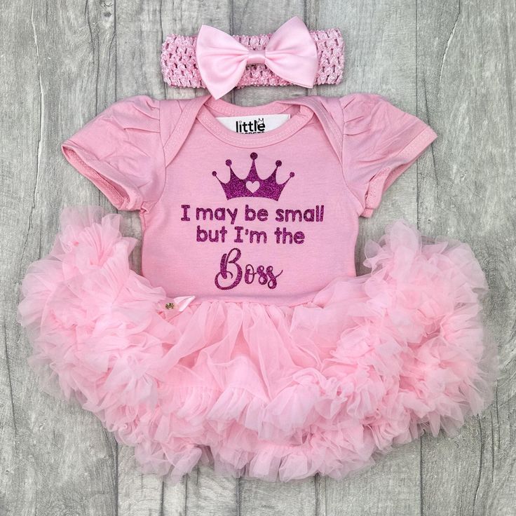 Gorgeous and Funny outfit for a Newborn Baby Girl! Perfect for a baby shower or baby arrival present. Baby girls cotton soft short sleeved Tutu Romper with a matching clip bow and headband - available in a variety of colours! Dark Pink glitter Princess Crown design with lettering underneath saying 'I may be small but I'm the Boss'. Any questions or queries please just message me :) Want to know a bit about who's making your gifts.... We are an award winning family business in the heart of Lancas Fitted Onesie For First Birthday, Pink Fitted Onesie For Birthday, Cotton Onesie For Baptism, Cute Fitted Cotton Diaper Cover, Fitted Cotton Sets For First Birthday, Pink Cotton Sets With Matching Headband, Fitted Cotton Onesie For First Birthday, Fitted Short Sleeve Onesie For First Birthday, Pink Cotton Baptism Onesie