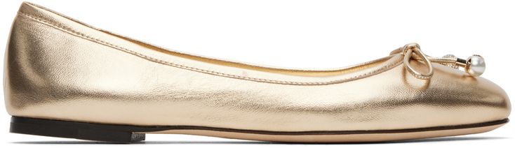 Nappa leather ballerina flats in gold tone. · Square toe · Bow with charms at vamp · Logo embossed at padded leather footbed · Buffed leather lining · Nubuck sole with rubber injection Supplier color: Gold Luxury Gold Ballet Flats, Luxury Gold Flats For Evening, Luxury Gold Flats, Luxury Gold Flats With Round Toe, Chic Gold Ballet Flats For Evening, Gold Ballet Flats With Leather Sole For Formal Occasions, Elegant Gold Ballet Flats With Leather Sole, Formal Gold Ballet Flats With Leather Sole, Elegant Gold Leather Ballet Flats