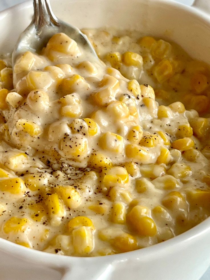 a white bowl filled with macaroni and cheese