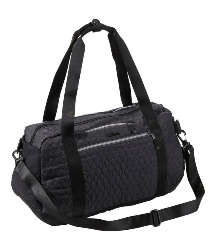 Our versatile, athleisure-inspired quilted duffle easily doubles as a weekender or gym bag. Lightweight and durable, with built-in organization that keeps everything right at hand. Meets most airline carry-on requirements. Spot clean. Sized to work as an underseat carry-on item. Two shoulder handles and one adjustable shoulder strap. Innovative embossed design retains quilted pattern and won't pull, tear or fray. Durable, 210-denier nylon. Double-layer bottom adds durability. Fleece-lined pocket Sporty Nylon Luggage For Everyday Use, Nylon Weekender Bag For Gym, Sporty Nylon Luggage With Functional Pockets, Sporty Everyday Quilted Bags, Sporty Luggage For Overnight Trips With Zipper Closure, Sporty Large Capacity Gym Bag For Overnight Trips, Practical Nylon Weekender Bag For Sports, Sporty Nylon Travel Bag For Gym, Functional Quilted Bag For Overnight Trips