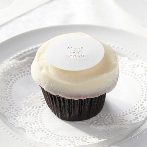 a cupcake on a white plate with a brown label that says muffins bridal snowflake