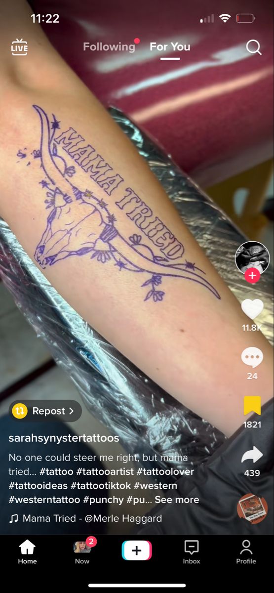 a person with a tattoo on their arm that says, follow us for you '