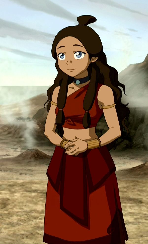 a woman in a red dress standing next to a mountain with steam coming from it