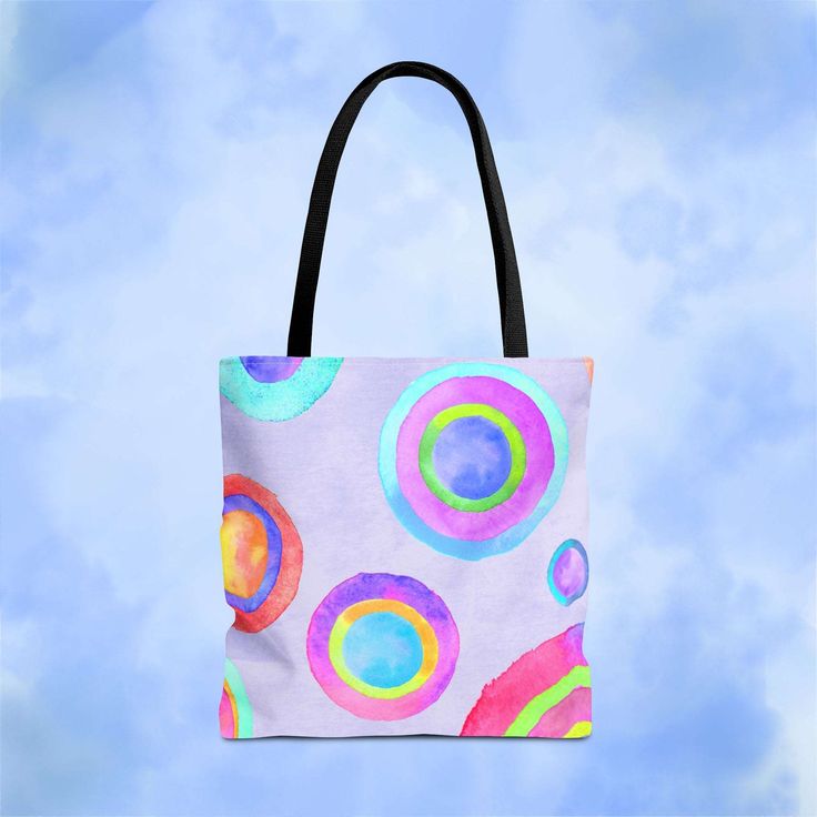 Introducing our Adorable All-Purpose Tote Bags – where style meets functionality! Available in three convenient sizes, these totes are perfect for any occasion, whether you're headed to the beach, the farmer's market, or a day out shopping. Made from 100% spun polyester, these bags are designed to withstand the rigors of daily use while keeping you looking chic and stylish. Choose from five vibrant handle colors to perfectly complement your unique designs. Our tote bags are not just about good l Summer Eco-friendly Bags With Reinforced Handles, Multicolor Reusable Summer Bags, Summer Rectangular Reusable Bag, Summer Reusable Rectangular Bag, Summer Rectangular Reusable Bags, Purple Tote Beach Bag For Shopping, Large Reusable Travel Bag, Multicolor Bag With Reinforced Handles For Everyday Use, Summer Recyclable Shopping Bags