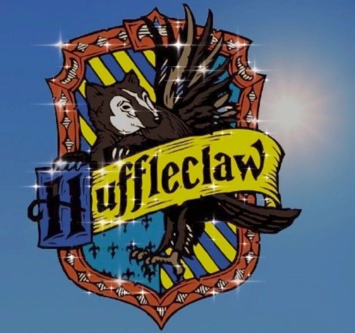 the harry potter house crest is shown against a blue sky