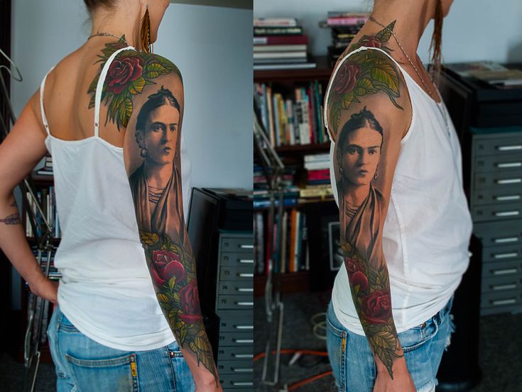 a woman with tattoos on her arms and shoulder