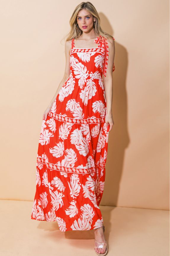 Get ready for your next vacation in our Red Palm Print Maxi Dress. With a stunning palm print pattern, straight neckline, and shoulder ties, you'll be sure to turn heads. The tiered skirt, lining, and back zipper closure add comfort and convenience to this stylish dress. Perfect for any tropical destination. Runs sligh Red Palm, Flying Tomato, Straight Neckline, Palm Print, Tier Skirt, Tiered Skirt, Printed Maxi, Printed Maxi Dress, Floral Maxi Dress