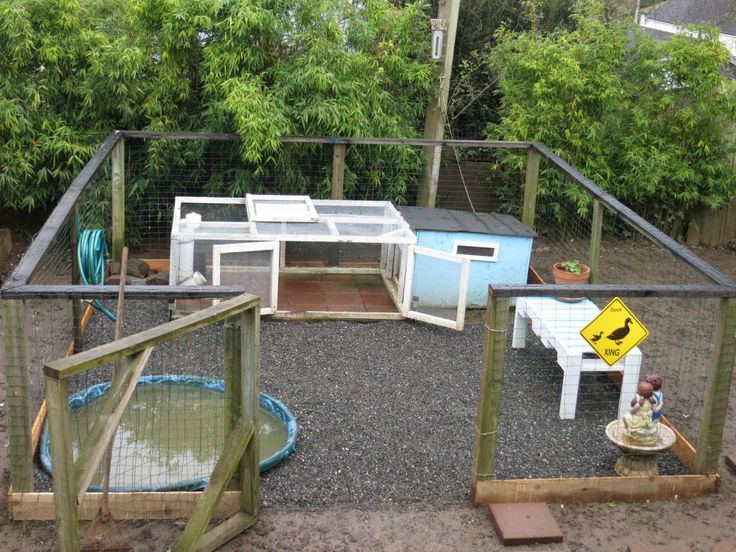 an outdoor play area with various items in it