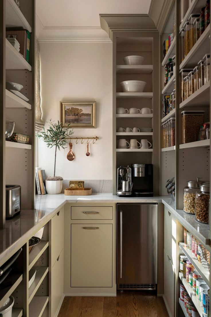 the kitchen is clean and ready to be used as a storage area for food items