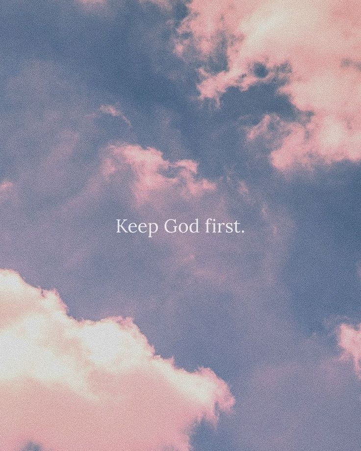 the words keep god first are written in white on a pink and blue sky