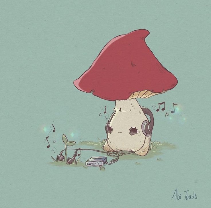 a mushroom with headphones is sitting in the grass