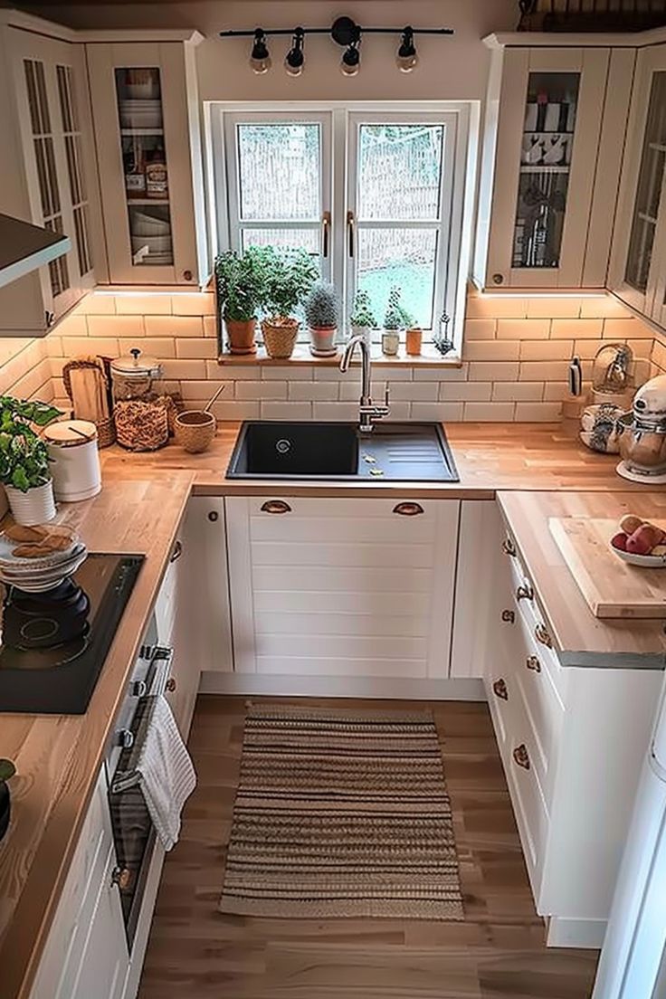 the kitchen is clean and ready for us to use in its new owner's home