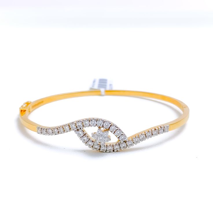 PRODUCT DETAILS Gold Purity(karat): 18k Item Weight(grams): 10.8 Item Finish: Yellow Gold Stone: Diamond Diamond Weight(carats): 0.99 ct Diamond Color: F-G Diamond Quality: VS Diamond Shape: Round Brilliant Cut Bangle Size: 2.3 Bangle Opening: 2.2" Bangle Opening Shape: Oval Openable: Yes, Hinge + Clasp w/Lock Luxury Diamond Bracelet With Marquise Cut, Luxury Marquise Cut Diamond Bracelet For Anniversary, Luxury Wedding Diamond Bracelet With Marquise Cut, Gold Marquise Diamond Bracelet For Anniversary, Luxury Diamond Bracelets With Marquise Cut, Luxury Diamond Marquise Bracelets, Luxury Diamond Bracelet Marquise Cut, Luxury Marquise Diamond Bracelets, Formal Marquise Diamond Bracelet With Diamond Accents