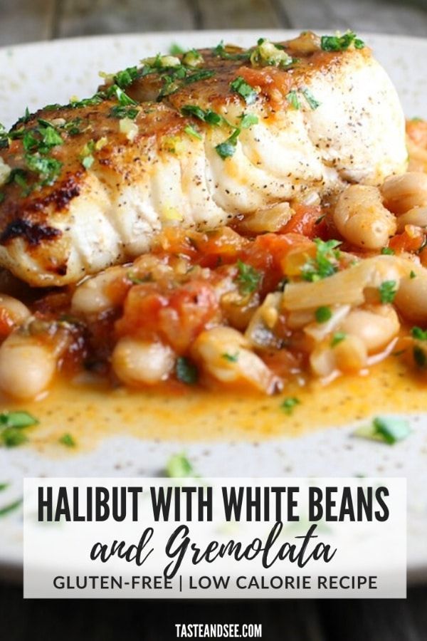 halibut with white beans and gremolata on a plate, garnished with parsley