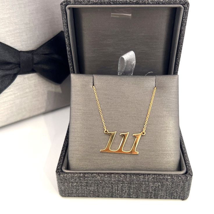 Elevate your style with our exquisite Personalized 14k Solid Gold Number Necklace. Crafted with precision and attention to detail, this unique piece features the enchanting number 111, adding a touch of individuality and luck to your daily ensemble. Made from high-quality 14k solid gold, this necklace exudes elegance and sophistication. The carefully chosen materials ensure durability and a lasting shine, making it a timeless addition to your jewelry collection. Customization takes center stage with this necklace, allowing you to embrace the power of your chosen number. The triple digits of 111 hold special significance for those who appreciate the allure of numerology or simply admire the aesthetic appeal of a trio of ones. Whether you're seeking a meaningful gift for a loved one or a per Formal Yellow Gold Jewelry With Initial Pendant, Formal White Gold Jewelry With Initials, Elegant 14k Gold Initial Pendant Custom Necklace, Elegant Initial Pendant Custom Necklace For Anniversary, Elegant 14k Gold Custom Initial Pendant Necklace, Elegant Custom 14k Gold Initial Pendant Necklace, Hallmarked Initial Pendant Jewelry For Formal Occasions, Formal Hallmarked Initial Pendant Jewelry, Classic Hallmarked 14k Gold Custom Necklace