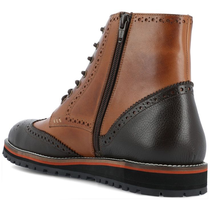 The Elijah boot by Thomas & Vine is crafted with authentic leather and wingtip details for an upscale look. A classic lace-up closure with brogue accents secures this well-made ankle-high style. The style is completed with a 6 mm Comfort Foam� footbed and a modern EVA outsole for a light and comfortable fit. Vintage Lace-up Boots With Brogue Detailing, Brown Goodyear Welted Lace-up Boots For Fall, Formal High-top Lace-up Boots With Brogue Detailing, Fall Lace-up Boots With Brogue Detailing And Round Toe, Fall Lace-up Brogue Boots With Round Toe, Winter Business Lace-up Boots With Brogue Detailing, Fall Lace-up Boots With Brogue Detailing, Casual Wingtip Lace-up Boots With Rubber Sole, Brown Cap Toe Lace-up Boots For Derby