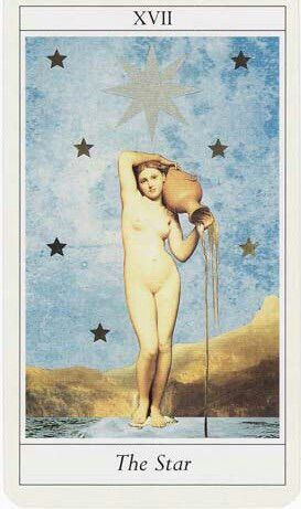 the star tarot card with a nude woman holding a jug on it's back