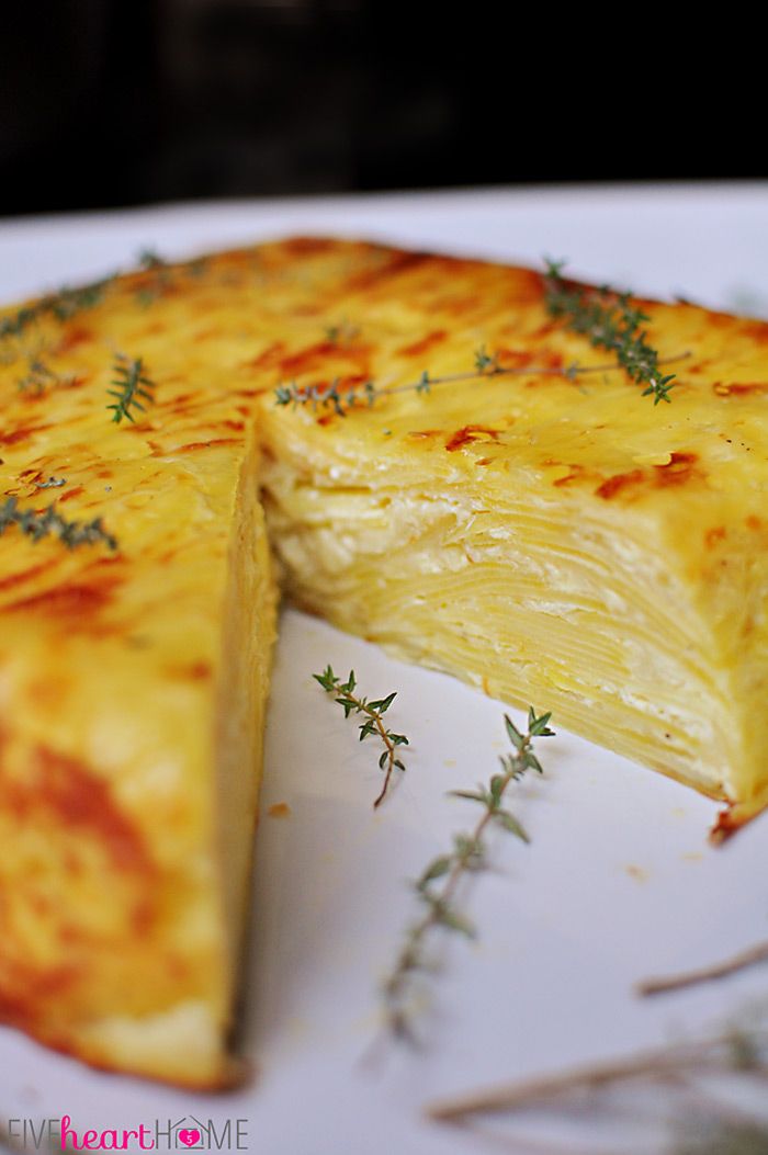 a piece of cheese cake on a white plate