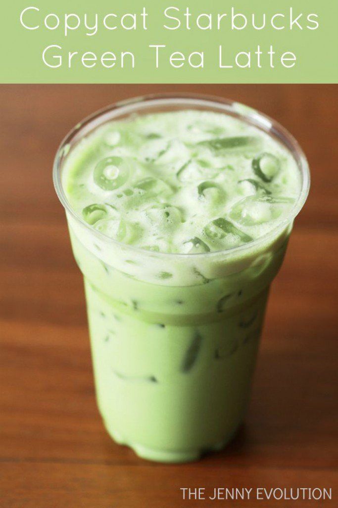 green tea latte in a plastic cup on a wooden table with the title copycat starbucks's green tea latte