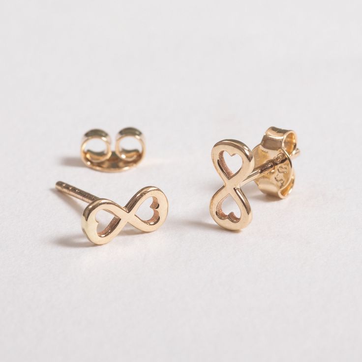 Tiny 14k 18k Solid Gold Infinity Earrings, Dainty Heart Infinity Single or Pair Gold Earring, Endless Love Earring Gift For Her Gift For Mom Material: Solid Gold, Real Gold (not gold filled or gold plated material) Available Gold Karat: 14K, 18K optional Available Gold Color: Yellow, Rose, White Earring width: 8.50 mm Earring height: 4.00 mm M o r e * F r o m * U s Goldstore Jewelry - https://etsy.me/3gHtcrZ * Urn Necklaces - https://etsy.me/2Asb4BM * Bar Necklaces - https://etsy.me/2MhoVxO * Na Gold Infinity Earrings For Anniversary, Gold Infinity Earrings Perfect For Gifts, Hypoallergenic Infinity Earrings For Gift, Gold Infinity Earrings, Cremation Urn Jewelry, Bar Necklaces, White Earring, Infinity Earrings, Infinity Heart