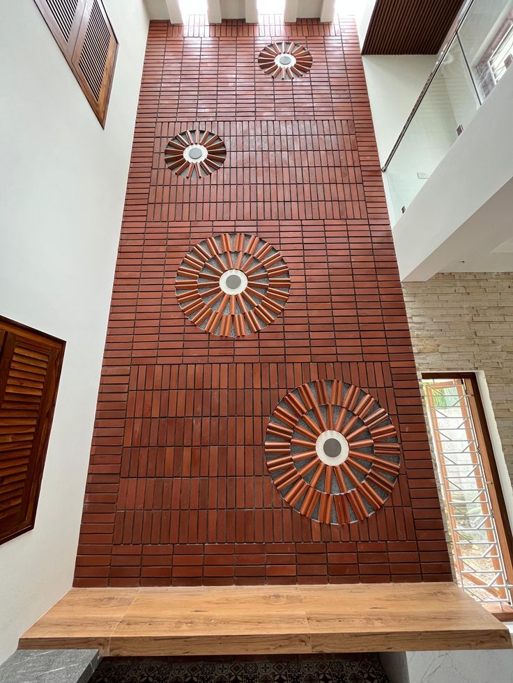 the inside of a building with decorative tiles on the wall