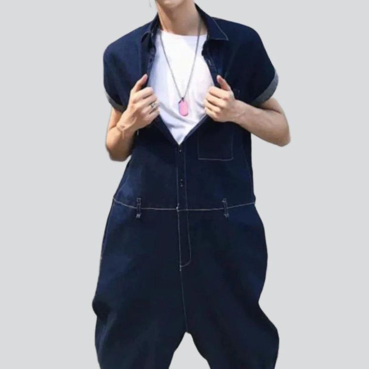 Welcome to the 2023 Spring-Summer Collection! Step up your street style with our one-of-a-kind navy denim overalls ââ‚?designed with dark wash. baggy fit. and button closure features to make a bold statement.Why Our Navy Denim Overalls Are a Must-Have Dark Wash for a Timeless Look: Make a statement with this shade of navy blue ââ‚?perfect for a night out or a day in the park. Baggy Fit for Comfort: Get the perfect fit with this relaxed silhouette ââ‚?designed to keep you comfortable all day long Casual Indigo Denim Jumpsuit, Trendy Relaxed Fit Short Sleeve Overalls, Casual Cotton Overalls In Indigo, Relaxed Fit Dark Wash Jumpsuits And Rompers, Casual Dark Wash Cotton Overalls, Cotton Utility Denim Jumpsuit With Button Closure, Utility Cotton Denim Jumpsuit With Button Closure, Denim Overalls With Relaxed Fit And Short Sleeves, Casual Cotton Dark Wash Jumpsuits And Rompers