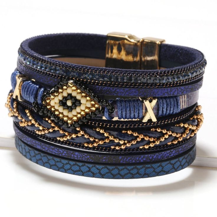 Boho Bracelet Bohemian Style Bracelet Leather Bangle  * [Material]: Plated alloy + Leather * [Size]: 20cm(8") * [Color]: Red/Blue/Black/Khaki * [Type]: Boho bracelet * [Occasion]: It's a bracelet made of bohemian style that is exotic and stylish. Design and shop a custom jewelry box here: https://bit.ly/TN-JewelryBox  About this Item * Quality material The leather of this bracelet has been through quality examination to make it durable. * Unique design Consist of different styles of woven ropes, this boho bracelet gives you a stylish look. The high-polished plated alloy adds a touch of elegance. * Cool gift to give The bracelet goes great with all sorts of styles, and it would be a surprise to receive this beautiful bracelet on his/her birthday, anniversary, etc. * Safe for sensitive skin Custom Jewelry Box, Leather Bangle, Buckle Bracelet, Bohemian Bracelets, Styl Boho, Leather Wrap Bracelet, Estilo Boho, Boho Bracelets, Style Boho