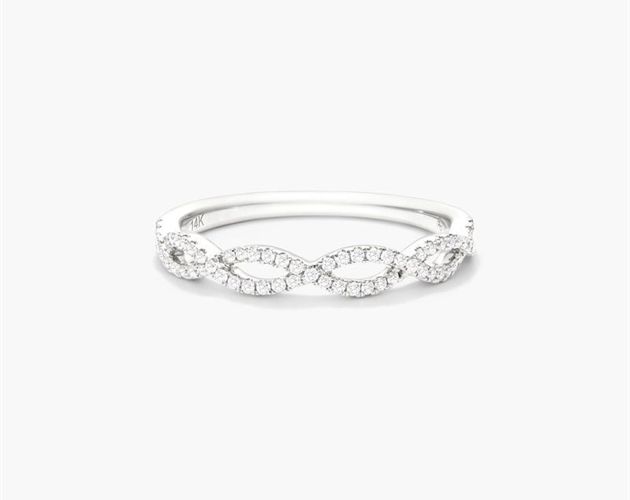 14K White Gold Petite Open Infinity Diamond Ring. The infinity design is a timeless classic perfect for everyday wear, and the open weave lends added elegance to this petite design. Crafted in 14K gold, this piece is beautiful worn on its own or with other stackables for a trendier look. Elegant Infinity Diamond Ring For Formal Occasions, Elegant Stackable Diamond Ring, Elegant Stackable Infinity Rings, Elegant Half Eternity Infinity Rings, Elegant Infinity Eternity Band For Anniversary, Elegant Infinity Diamond Ring With Accents, Elegant Infinity Half Eternity Rings, Elegant Infinity White Gold Rings, Elegant White Diamond Ring With Open Band