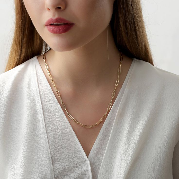 Talia Trends never stop, and our 14k gold paper clip chain necklaces are only here to prove that. You can also hang the charms of your choice onto this necklace! Choose the paperclip width and length you desire for the best comfortable fit. - Handmade- Solid Gold- Chain Width and Length: - 3.4 x 10 mm - 4.25 x 12 mm - 5 x 16 mm- High-End Polish * Chains are hollow. All pieces come beautifully boxed in suede pouches you can always use (which really comes in handy when traveling!) Gold Minimalist Necklace, Minimalist Necklace Gold, Crown Necklace, Handmade Fine Jewelry, Solid Gold Chains, Rose Gold White, White Gold Necklaces, Gold Paper, Gold Crown