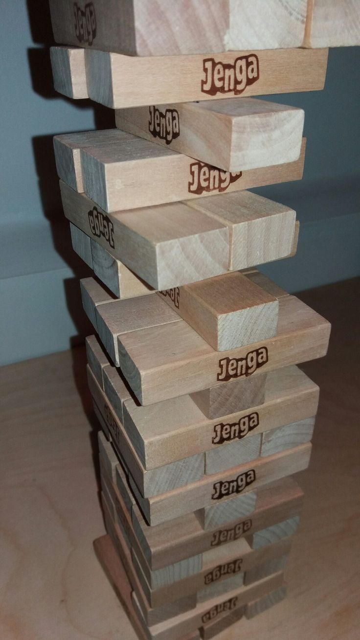 several pieces of wood stacked on top of each other with the word lenga written on them