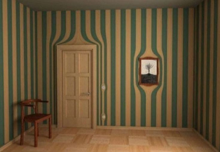 an empty room with green and white stripes on the walls that say don't touch the lines