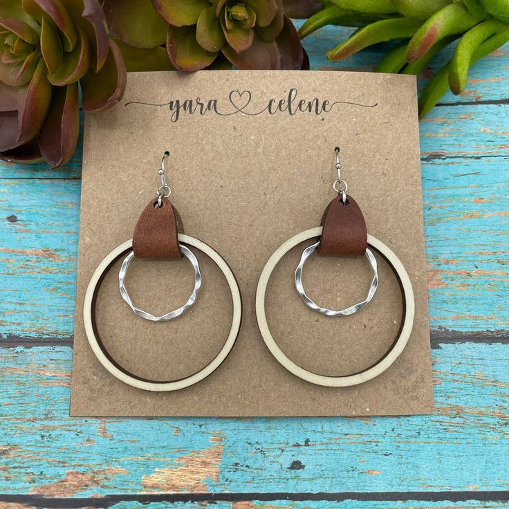 Classy. Simple. Beautiful. These earrings are 1.5" and feature the option of Basswood or Walnut paired with genuine leather and gorgeous silver plated hardware. Everyday Brown Wood Earrings, Brown Small Hoop Earrings For Everyday, Brown Nickel-free Hoop Earrings For Everyday, Nickel-free Brown Hoop Earrings For Everyday, Wooden Hoop, Wooden Earrings, Silver Plate, Silver Plated, Walnut