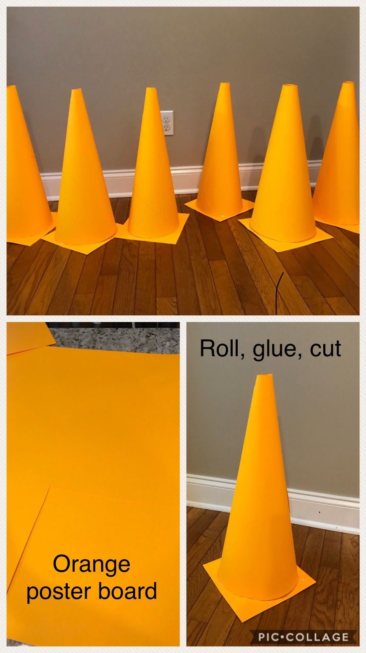 the orange poster board has been placed on the floor to make it look like cones