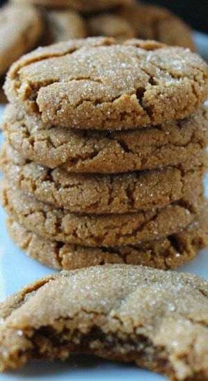 a stack of cookies sitting on top of a white plate