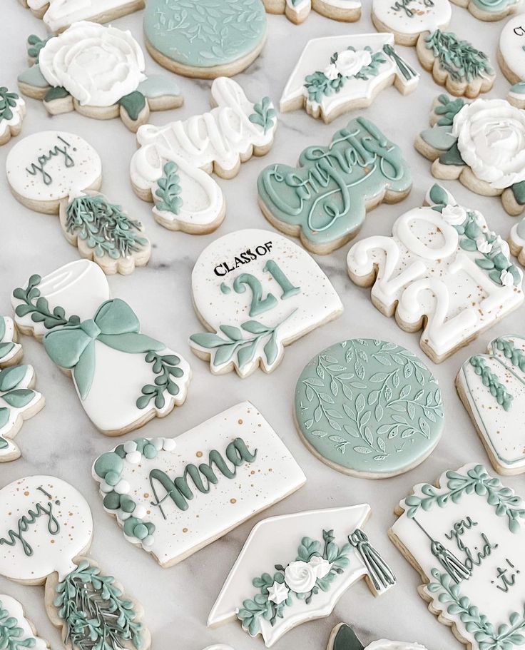 baby shower cookies are arranged on a table