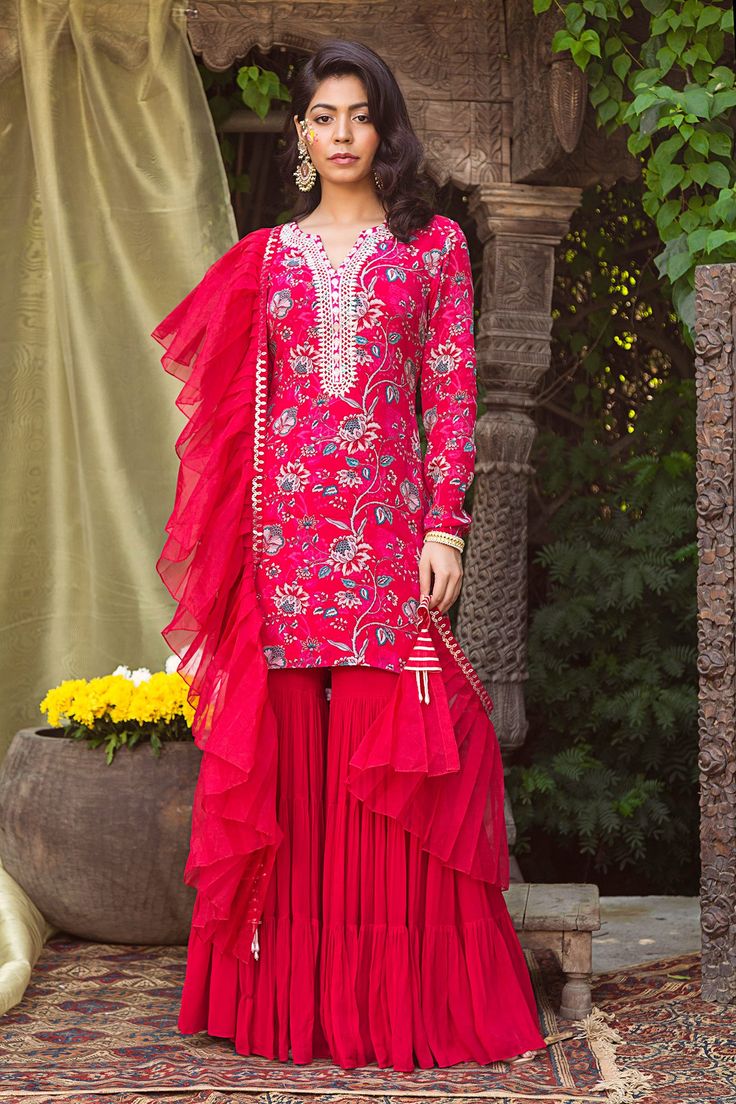 Red kurta with printed floral motifs. Comes with sharara and sheer dupatta.
Components:3
Embroidery
Neckline:Notched round
Sleeve Length:Full
Fabric:Organza, Georgette, Crepe
Color:Red
Hand embroidery
Embroidered motifs on neckline and sleeve hems
Pleated detail on dupatta
Sequin motifs on dupatta border
Tassel detail on dupatta hems - Aza Fashions Red Sharara, Kurta And Dupatta, Pleated Organza, Sharara Pants, Kurta Sharara Set, Red Kurta, Kurta Sharara, Sharara Set, Organza Dupatta