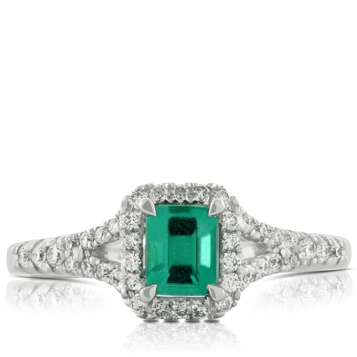 Emerald ring with 1/5 carat total weight of diamonds, in 14K white gold. 14k White Gold Emerald Ring With Brilliant Cut, 14k White Gold Emerald Cut Halo Ring, Diamond Emerald Ring With Pave Setting, Formal Platinum Emerald Ring With Pave Setting, Silver 14k White Gold Diamond Ring, Emerald Cut, Emerald Ring With Center Stone In 14k White Gold, 14k White Gold Emerald-cut Diamond Ring, 14k White Gold Emerald Cut Diamond Ring, White Diamond Emerald Ring With Center Stone