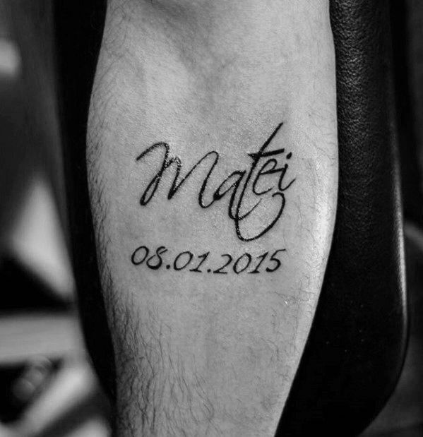 a man with a tattoo on his leg that says may 05, 2013 and has the date in cursive writing